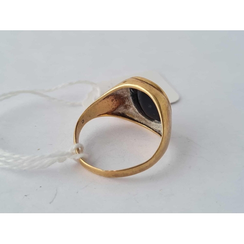 133 - A onyx signet ring 9ct size O 1/2 - 4 gms