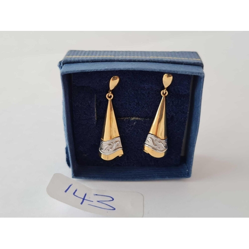 143 - A pair of yellow and white gold drop earrings 9ct - 2.1 gms