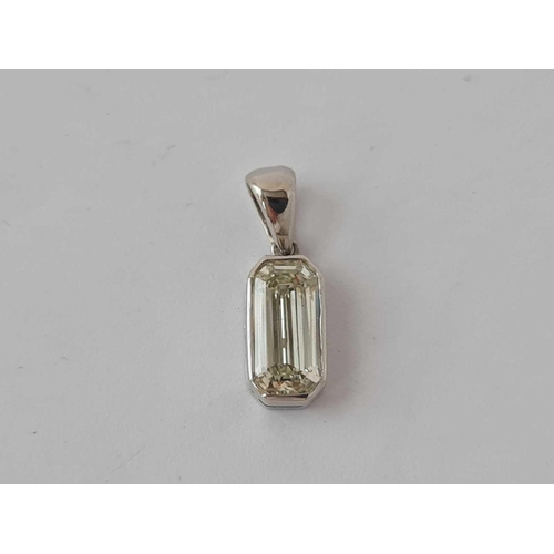 155 - EMERALD CUT DIAMOND DROP PENDANT SET IN PLATINUM WEIGHING 1.35cts (known weight)