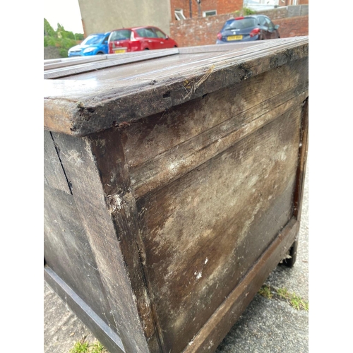 1686 - A 17th Century oak coffer with panelled front and top