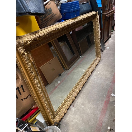 1687 - A large gilt framed mirror  69 wide