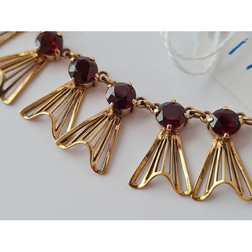 171 - A deco style fluted seven stone drop garnet pendant necklace