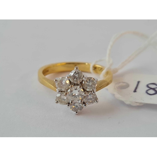 180 - A GOOD DIAMOND SEVEN STONE FLOWER HEAD CLUSTER RING 18CT GOLD 1 CARAT DIA CENTRAL STONE 5MM OTHER ST... 