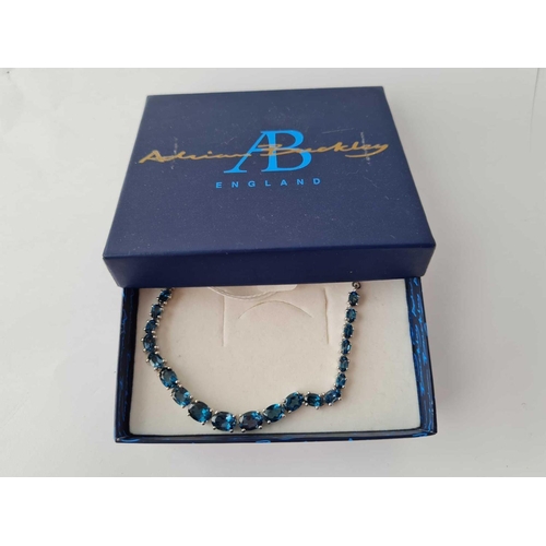 189 - A attractive silver and blue topaz necklace