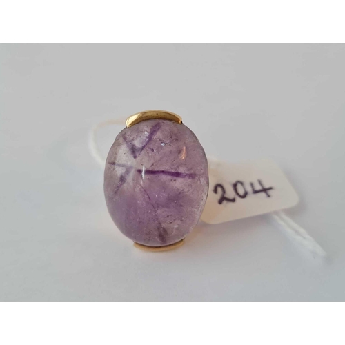 204 - A large purple stone signet ring 9ct size k - 12.3 gms