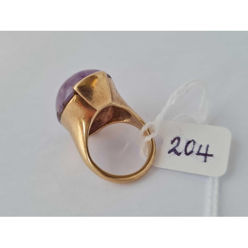 204 - A large purple stone signet ring 9ct size k - 12.3 gms