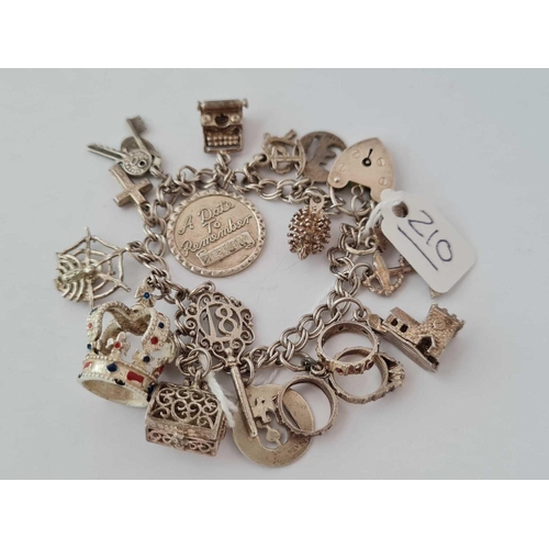 210 - A silver charm bracelet - 37 gms