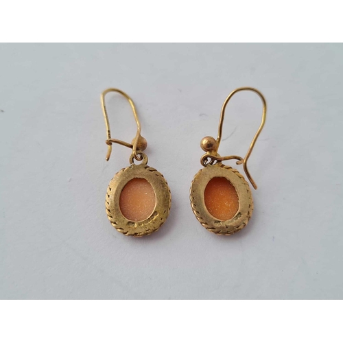 221 - A pair of cameo earrings 9ct - 2 gms