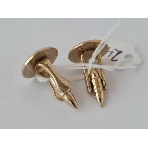 248 - A pair of gilt metal cufflinks in the form of foot balls