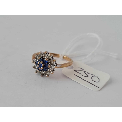 250 - A blue stone cluster ring 9ct size M - 2.3 gms