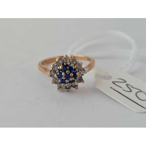 250 - A blue stone cluster ring 9ct size M - 2.3 gms