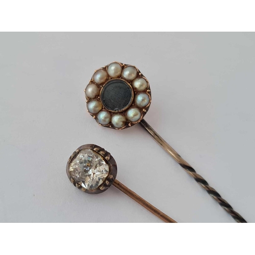 251 - A Georgian gold paste set stick pin and Victorian gold and pearl memorial stick pin