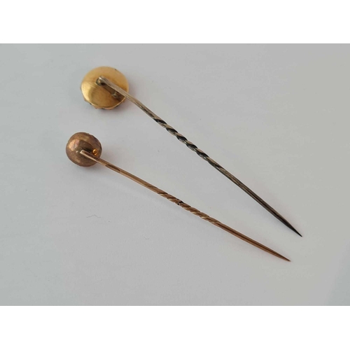 251 - A Georgian gold paste set stick pin and Victorian gold and pearl memorial stick pin