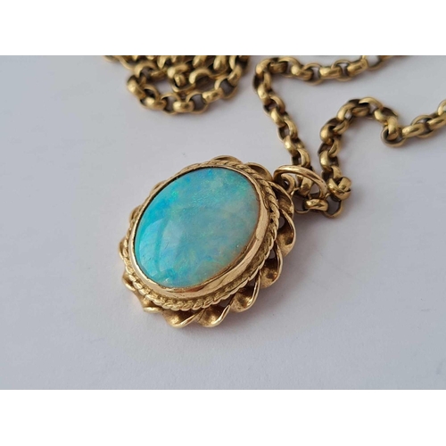 254 - A gold (tested) good colour opal pendant and chain