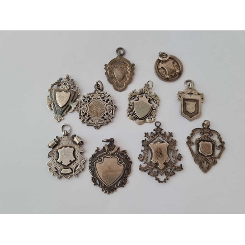 261 - 10 x assorted antique silver fob medals 94.3g