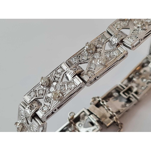 263 - A GOOD ART DECO PLATINUM AND DIAMOND PANEL BRACELET 28.3g INC