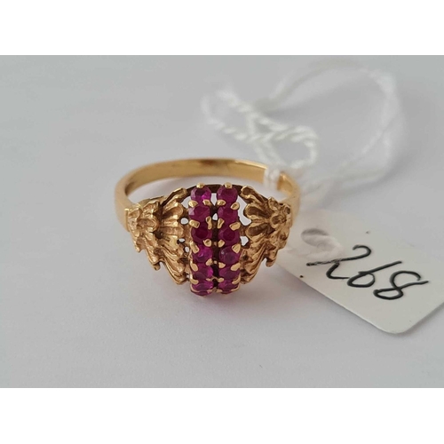 268 - A ruby cluster ring in 18ct gold size K 3.6g inc