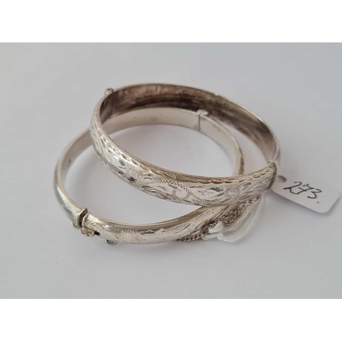 273 - Two silver scroll engraved hinged bangles 28g