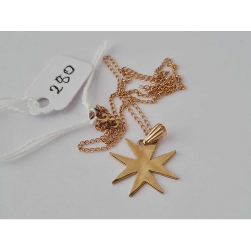 280 - A gold star necklace on gold chain 2.6g