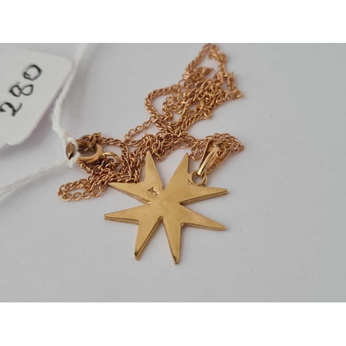 280 - A gold star necklace on gold chain 2.6g