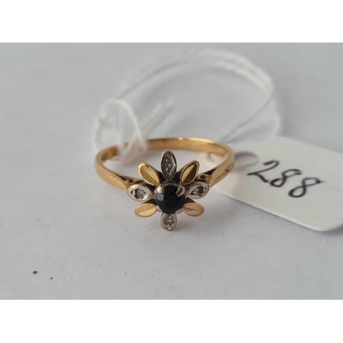 288 - A sapphire and diamond flower head ring 18ct gold size K - 1.9 gms