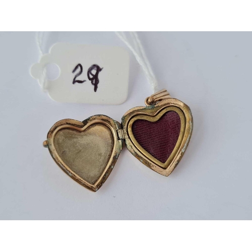29 - A heart shaped back and front locket 9ct - 2.9 gms