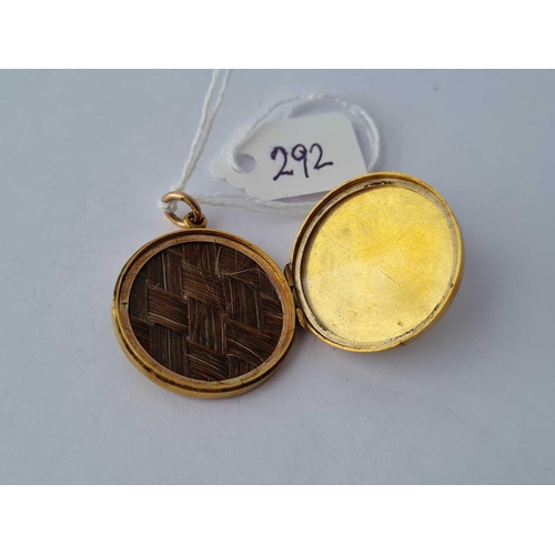 292 - A engraved locket 9ct - 6.3 gms