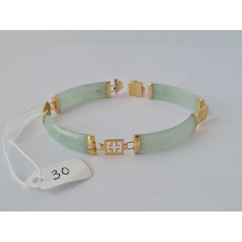 30 - A jadeite bracelet 9ct