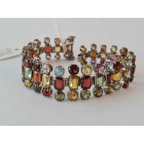 309 - A stunning silver and gem set bracelet