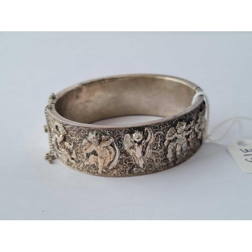 313 - A unmarked silver curb decorated bangle