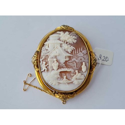 320 - A gilt mounted oriental carved cameo