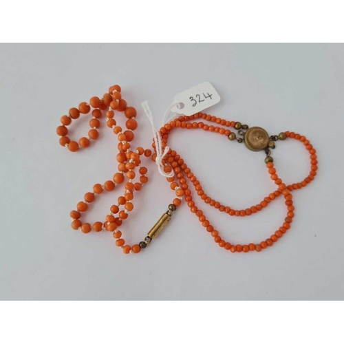 324 - A coral necklace and bracelet