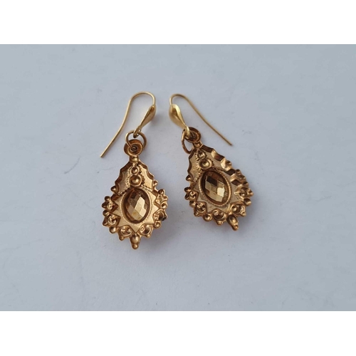 338 - A pair of embossed earrings 9ct