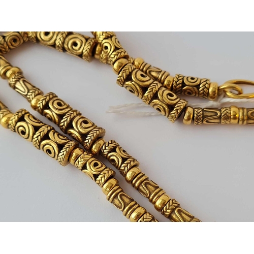 370 - A designer yellow metal muti togal bead necklace