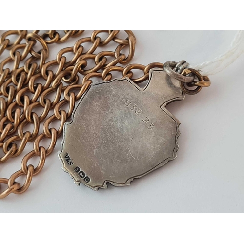 371 - An antique rolled gold Albert chain with silver & gold fob medal