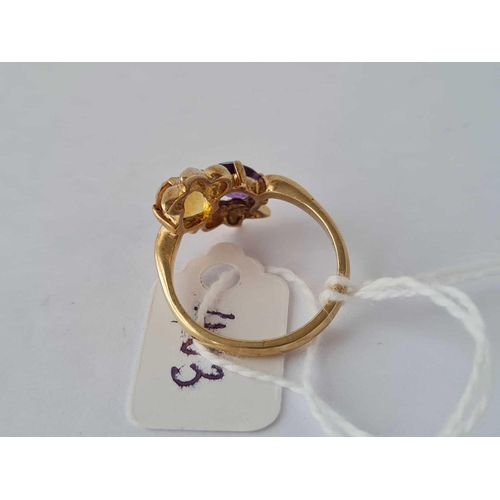 403 - A amethyst and citrine ring 9ct size m - 3 gms