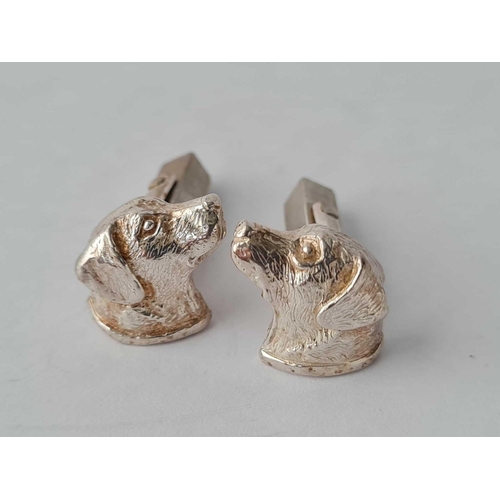 414 - A silver dog brooch and matching cufflinks