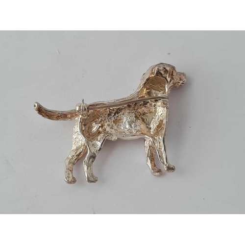 414 - A silver dog brooch and matching cufflinks