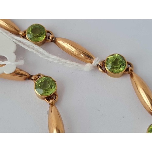 421 - ANTIQUE VICTORIAN 15CT STAMPED BRACELET SET WITH PERIDOTS, LENGTH 187MM.