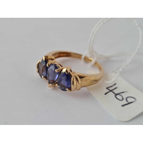 469 - A three stone pear shaped tanzanite band ring 9ct size N - 3.2 gms