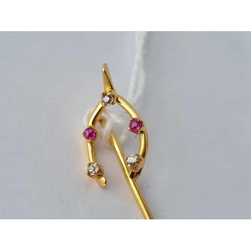 472 - A ruby and diamond set stick pin 15ct gold - 1.3 gms