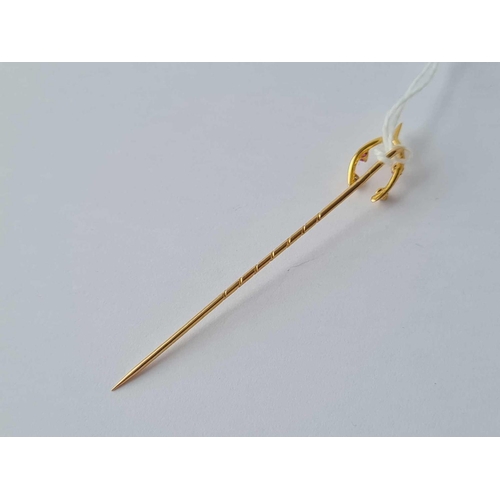 472 - A ruby and diamond set stick pin 15ct gold - 1.3 gms