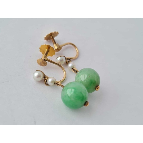 495 - A pair of pearl and green stone earrings 9ct