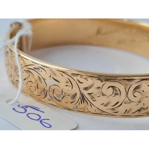 506 - A rolled gold bangle