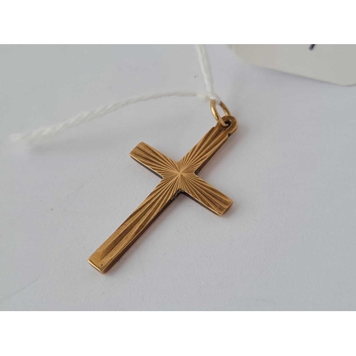 519 - A 9ct cross - 1.8 gms