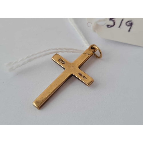 519 - A 9ct cross - 1.8 gms