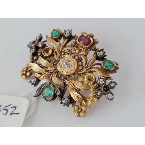 552 - ANTIQUE EARLY VICTORIAN GOLD BROOCH SET WITH DIAMONDS, EMERALDS, GARNET, CITRINES AND A CENTRAL DIAM... 