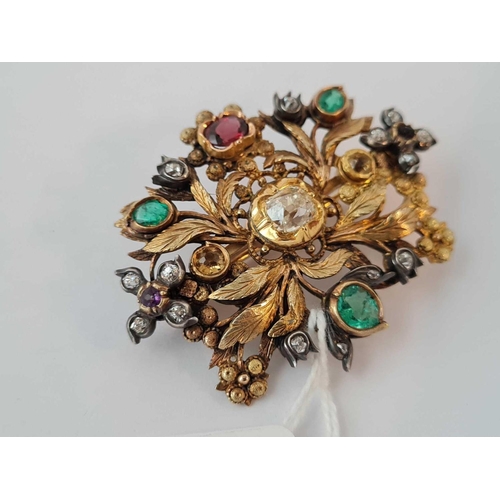 552 - ANTIQUE EARLY VICTORIAN GOLD BROOCH SET WITH DIAMONDS, EMERALDS, GARNET, CITRINES AND A CENTRAL DIAM... 