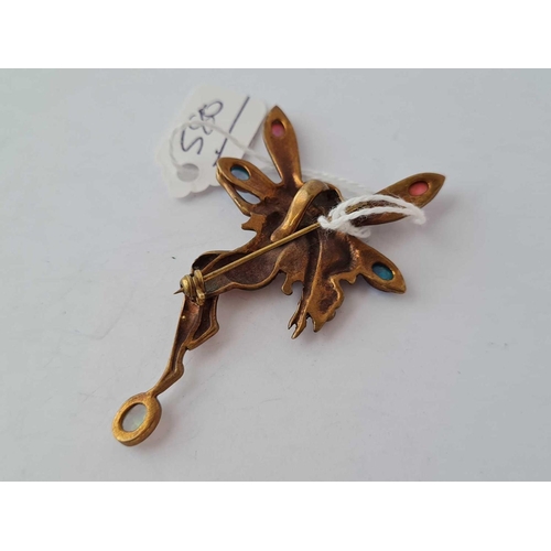 580 - A art nouveau yellow metal brooch of a fairy with five opals and doublets