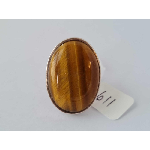 611 - A large oval silver tigers eye ring